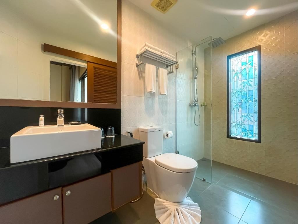 rooms-deluxe-balcony-twin-garden-view